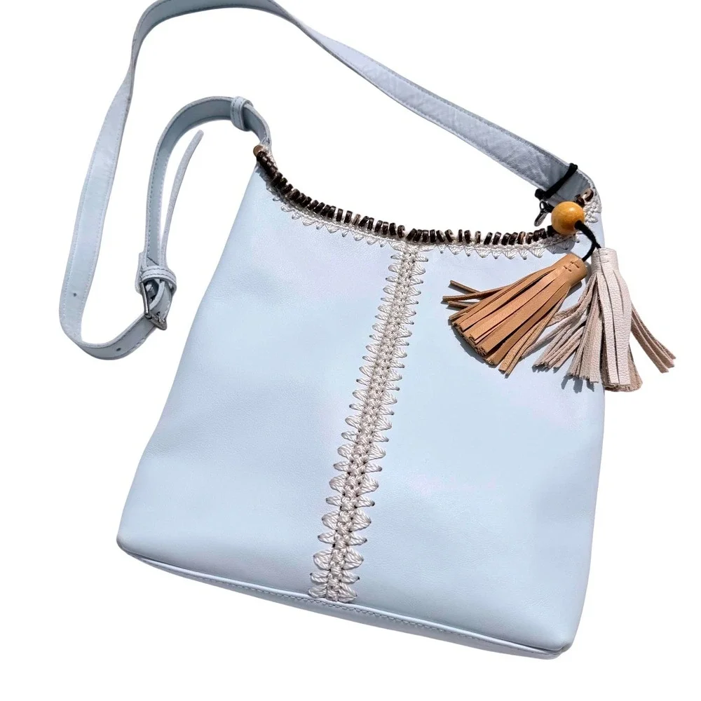 The Sak Huntley Chambray Blue Pebbled Leather Hobo Crossbody Bag Tassel Boho